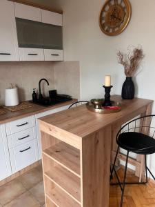 Kuchyň nebo kuchyňský kout v ubytování Apartman D Dream