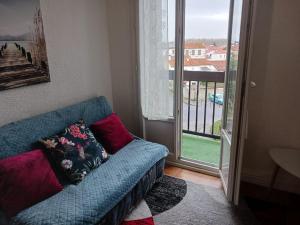 Posedenie v ubytovaní APPARTEMENT T2 confort,Parking,balcon,près Parc des Expositions,10 minutes plage