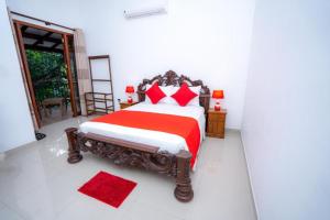Postel nebo postele na pokoji v ubytování Kandy Grand Hill