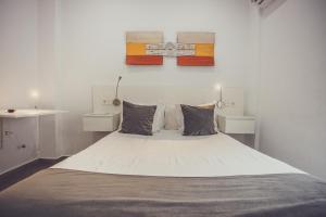 Posteľ alebo postele v izbe v ubytovaní Habitaciones El Olivo, Calidad y Reformardo