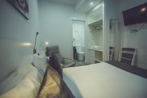 Posteľ alebo postele v izbe v ubytovaní Habitaciones El Olivo, Calidad y Reformardo
