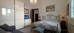 Katil atau katil-katil dalam bilik di House With Bikes Included By Belcantovillas