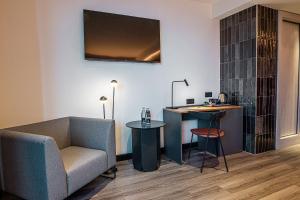 TV a/nebo společenská místnost v ubytování Silken Saaj Maar - Adults Only