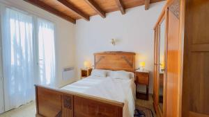 Ένα ή περισσότερα κρεβάτια σε δωμάτιο στο location proche des plages