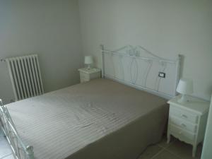 Posteľ alebo postele v izbe v ubytovaní B&B Posta Piana