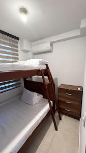 Postel nebo postele na pokoji v ubytování Extraordinario apartamento con BBQ + 16 fotografií