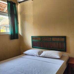 Postel nebo postele na pokoji v ubytování Villa Beach Anyer 1 by Anyer Adventure