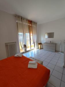 Ένα ή περισσότερα κρεβάτια σε δωμάτιο στο Residenza Tiziana