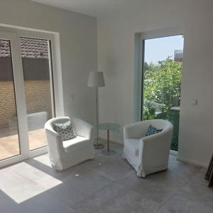 Χώρος καθιστικού στο Moderne Ferienwohnung am Straberger See