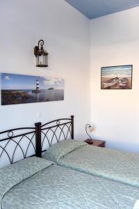 Postel nebo postele na pokoji v ubytování Delfini Hotel