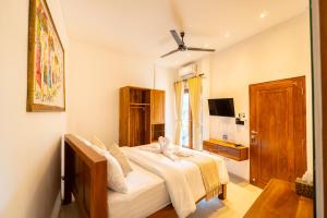 TV a/nebo společenská místnost v ubytování Lemon Tree Hotel Bali
