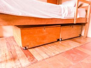 A bed or beds in a room at Loki Cusco