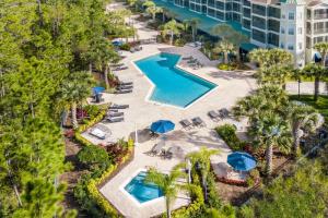 an overhead view of a pool at a resort at Near Disney - Spacious 3BR Condo with Pool in Orlando