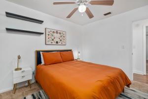 Ένα ή περισσότερα κρεβάτια σε δωμάτιο στο Family friendly - Fire pit -4 min to UF - Spacious