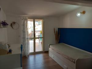 Postel nebo postele na pokoji v ubytování Casa sulla Punta
