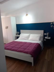 Postel nebo postele na pokoji v ubytování Casa sulla Punta