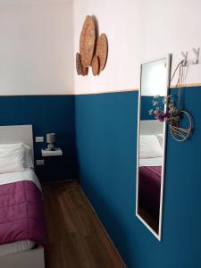 Postel nebo postele na pokoji v ubytování Casa sulla Punta