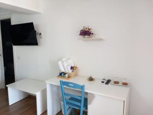 TV a/nebo společenská místnost v ubytování Casa sulla Punta