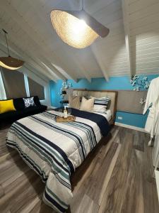 Postel nebo postele na pokoji v ubytování Parguera Beach Club & Hotel