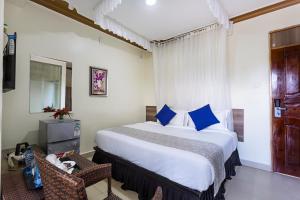 Una cama o camas en una habitación de SKYZ9 HOTEL