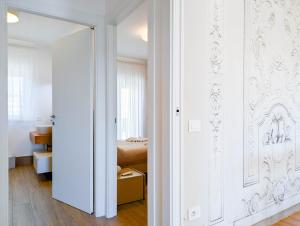 a room with a door leading to a bedroom at Appartamenti Pamar in Civitanova Marche +75 photos