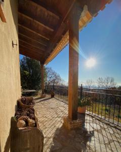 a covered patio with a view of the water at Vergel San Pedro in Torremenga +11 photos