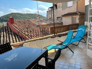 Balkón nebo terasa v ubytování Piso en Vall de Almonacid con vistas, aire acondicionado, Wifi y Smart TV