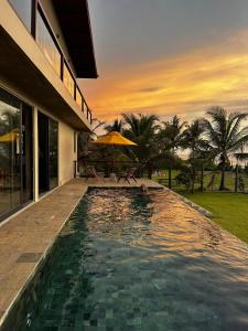 Bazén v ubytování Stonewater Beach Villa, Negombo nebo v jeho okolí