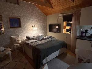 Voodi või voodid majutusasutuse Ulvsby Ranch Western Camp toas