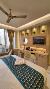 Hotel Central Tree客房内的一张或多张床位