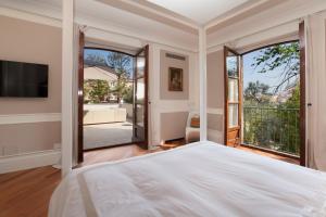 A bed or beds in a room at Relais Villa Russo
