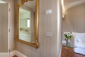 A bed or beds in a room at Relais Villa Russo