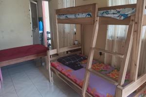Postel nebo postele na pokoji v ubytování Larosa Hostel Puerto Princesa