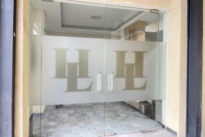 Vuode tai vuoteita majoituspaikassa Hotel Lengkong 2