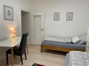 Postel nebo postele na pokoji v ubytování Ferienwohnung Kim