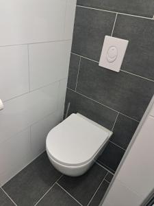 Koupelna v ubytování Feriënhaus Hohe Acht + 9 fotografií