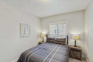 Ένα ή περισσότερα κρεβάτια σε δωμάτιο στο 6th Street Retreat