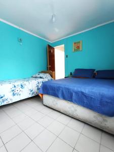 Hostal Caleta Abarca客房内的一张或多张床位