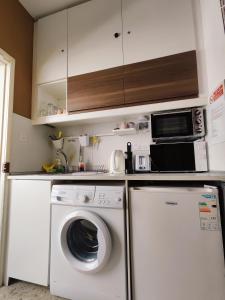Kuchyň nebo kuchyňský kout v ubytování Elena Holiday Apartment + 7 fotografií