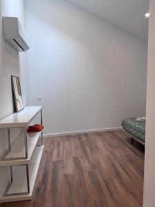 Ένα ή περισσότερα κρεβάτια σε δωμάτιο στο new very centric apartment