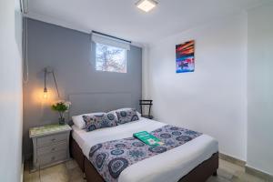Cama o camas de una habitación en Hotel Elegant Suite
