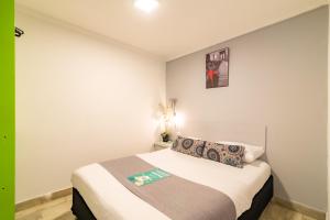 Cama o camas de una habitación en Hotel Elegant Suite
