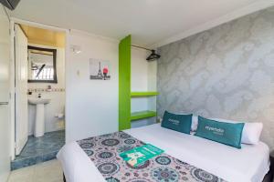 Cama o camas de una habitación en Hotel Elegant Suite