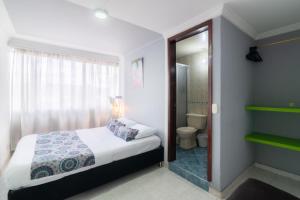 Cama o camas de una habitación en Hotel Elegant Suite