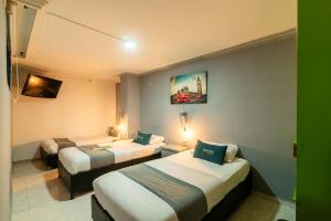 Cama o camas de una habitación en Hotel Elegant Suite