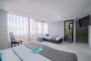 Cama o camas de una habitación en Hotel Elegant Suite