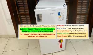 a white cooler with a sign on top of it at Cabo Frio - Suítes - Jardim Flamboyant - Aluguel Econômico in Cabo Frio