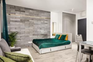 Część wypoczynkowa w obiekcie Lumina cozy apartments Manufaktura