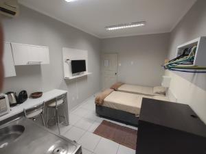 Η κουζίνα ή μικρή κουζίνα στο AptoStudio centro Floripa 104