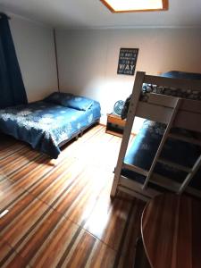 Hostal Caleta Abarca客房内的一张或多张床位
